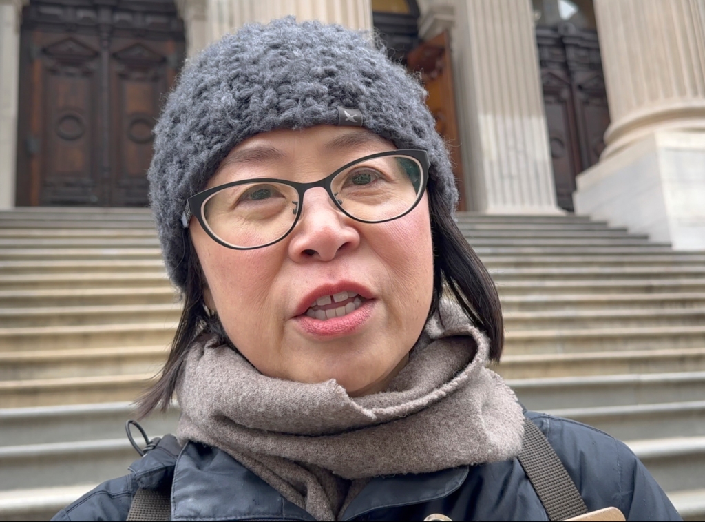 Activist Yiatin Chu questioned what Gillibrand has done for the Asian-American community.