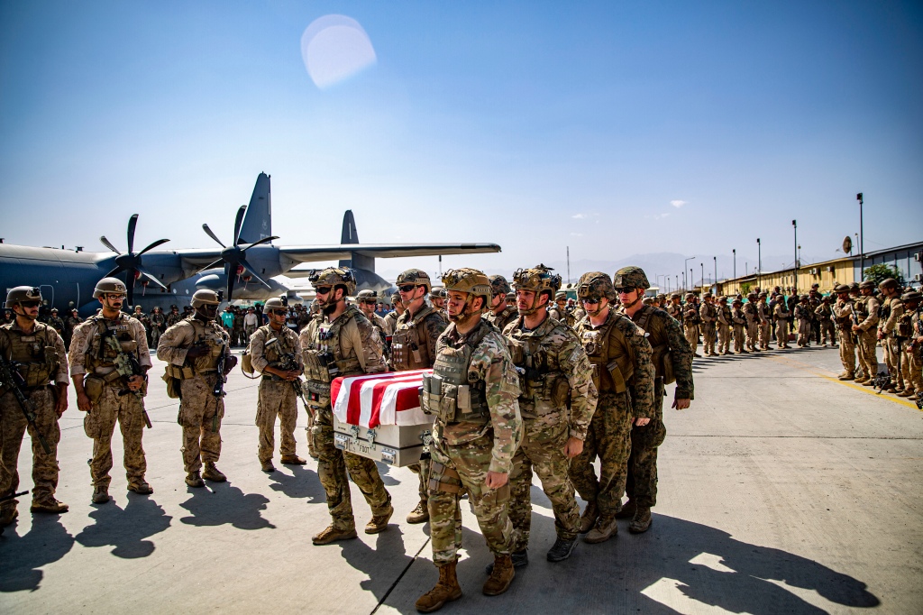 US service members assigned to Joint Task Force-Crisis Response, are pallbearers on Friday, Aug. 27, 2021, for the service members killed in action during operations at Hamid Karzai International Airport in Kabul, Afghanistan