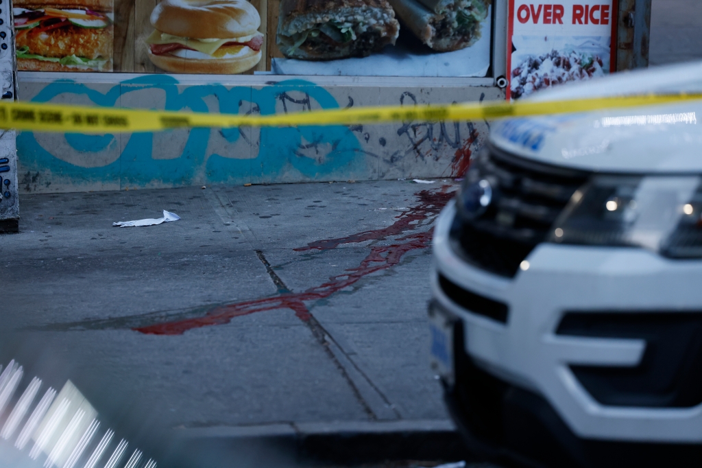 A blood trail is seen at the scene of the shooting at West 162nd Street and Broadway in Washington Heights. 