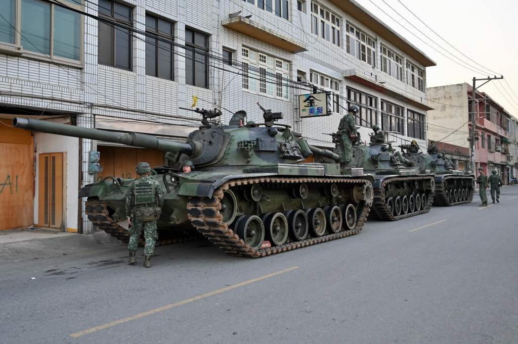 US made M60-A3 tanks are on standby in an alley during a military drill in Taoyuan on March 23, 2023. 