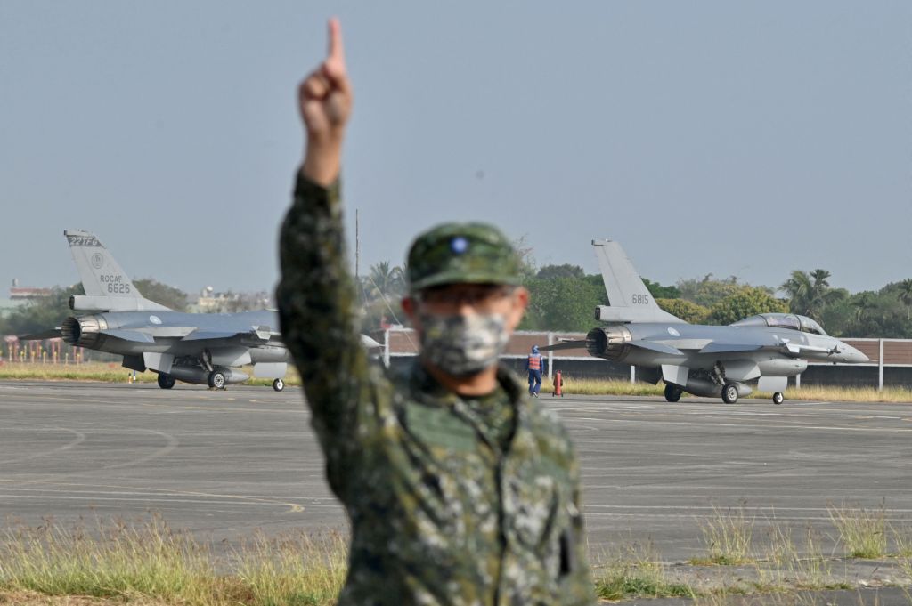 Two US-made F-16 V jet fighters are seen on the run way at an air force base in Chiayi county on March 25, 2023. 