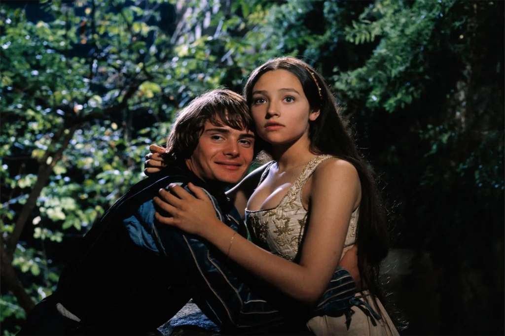 Whiting and Hussey in Romeo and Juliet embracing
