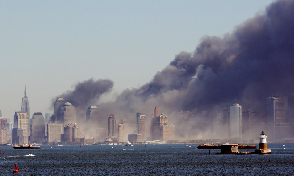 Smoke billows from lower Manhattan, Tuesday, Sept. 11, 2001,