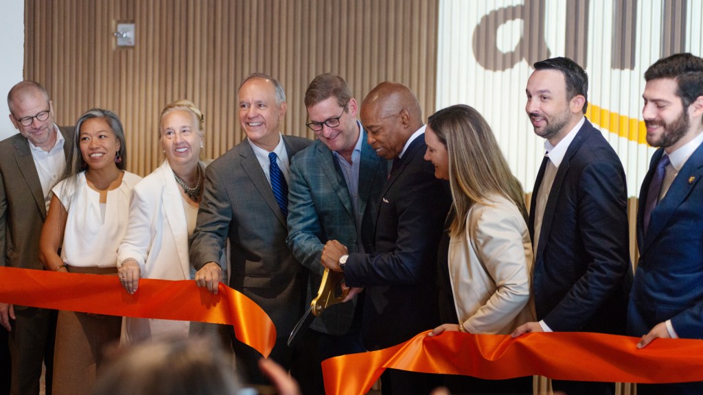 A ribbon cutting with Mayor Eric Adams and other city officials.