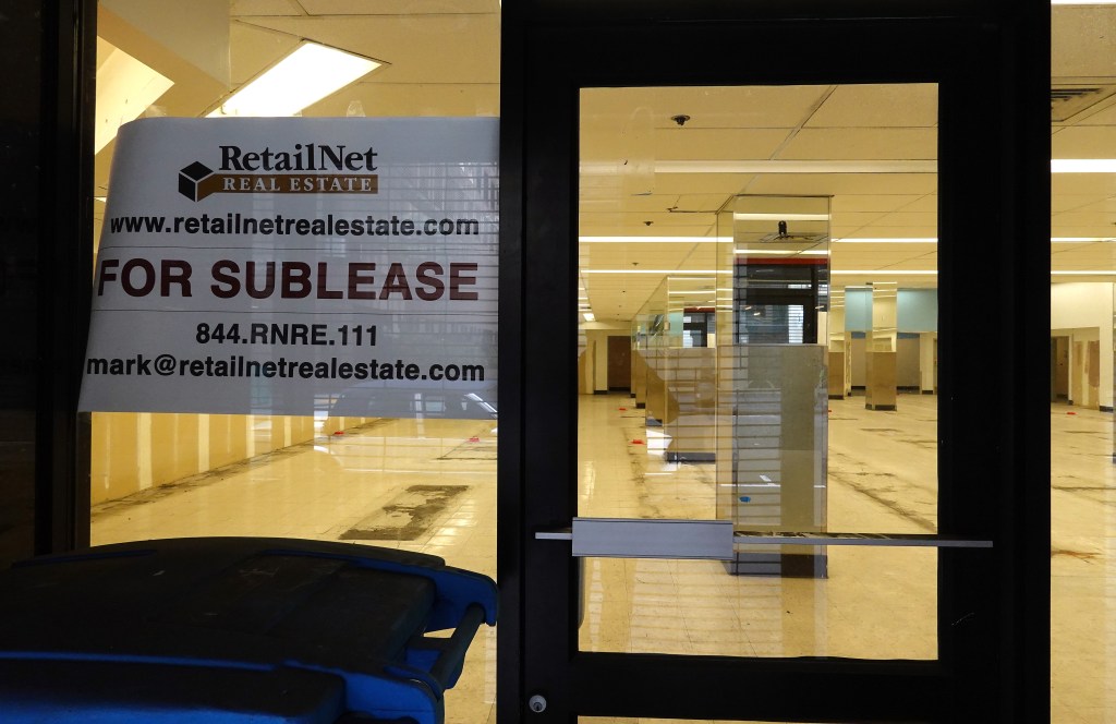 A sign is posted on the window of a retail space for lease in San Francisco, California due to the struggle of keeping commercial properties rented.